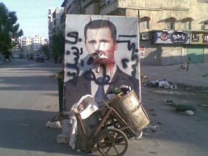 zniszczony.plakat.asad.syria
